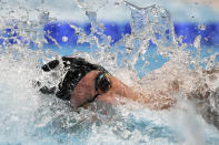 Caeleb Dressel of the United States swims in the men's 100-meter freestyle final at the 2020 Summer Olympics, Thursday, July 29, 2021, in Tokyo, Japan. (AP Photo/Matthias Schrader)