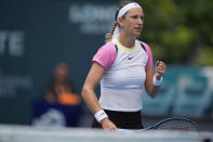 Victoria Azarenka celebrates winning a point against Yulia Putintseva, of Kazakhstan, in their women's singles quarterfinal match at the Miami Open tennis tournament, Tuesday, March 26, 2024, in Miami Gardens, Fla. (AP Photo/Rebecca Blackwell)