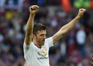 Britain Football Soccer - Crystal Palace v Manchester United - FA Cup Final - Wembley Stadium - 21/5/16 Manchester United's Michael Carrick celebrates after winning the FA Cup at the end of the match Reuters / Toby Melville