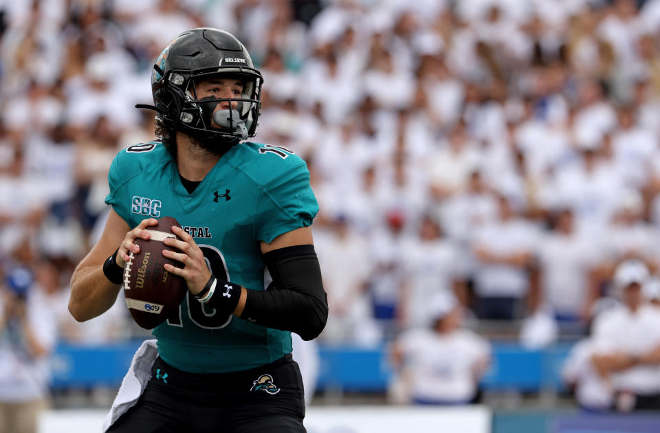 BUFFALO, NY - SEPTEMBER 18: Grayson McCall #10 of the Coastal Carolina Chanticleers drops back to throw a pass against the Buffalo Bulls at UB Stadium on September 18, 2021 in Buffalo, New York. (Photo by Timothy T Ludwig/Getty Images)