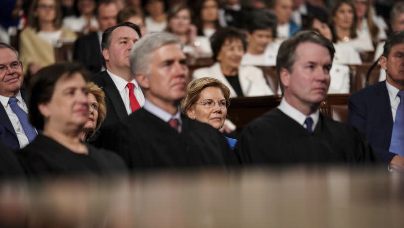 President Donald Trump gives his State of the Union address to a joint session of Congress, Tuesday, Feb. 5, 2019, at the Capitol in Washington, as Supreme Court Justices Elena Kagan, Neil Gorsuch and Brett Kavanaugh look on.