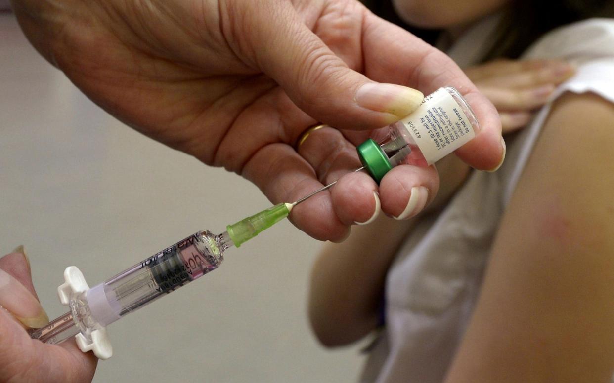 The populist coalition has gradually performed a U-turn on its previous scepticism over vaccinations - PA