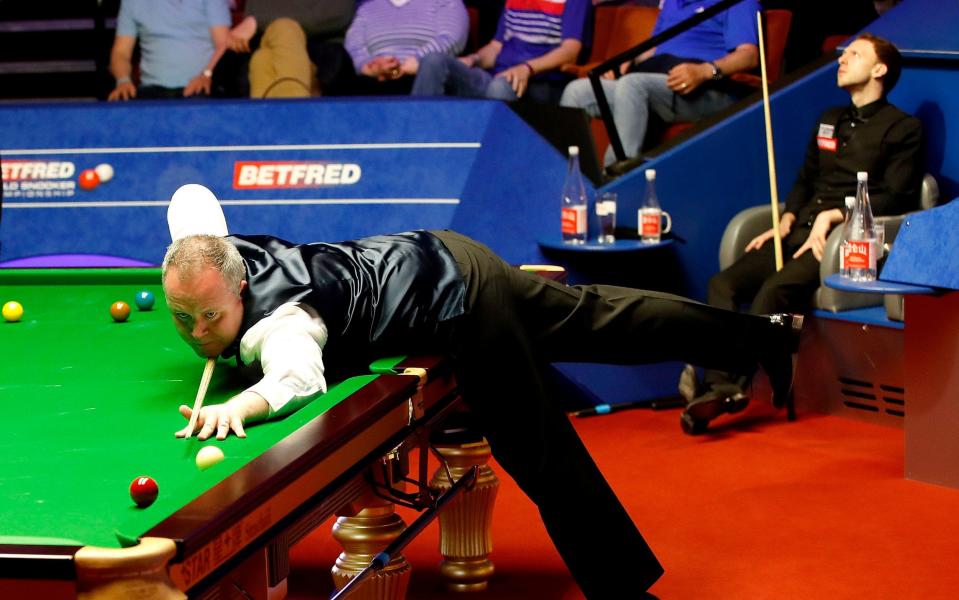 John Higgins on his way to beating young pretender Judd Trump - PA