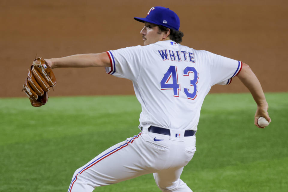 Texas Rangers reliever Owen White throws to the Los Angeles Angels during the fifth inning of a baseball game, Tuesday, June 13, 2023, in Arlington, Texas. (AP Photo/Gareth Patterson)