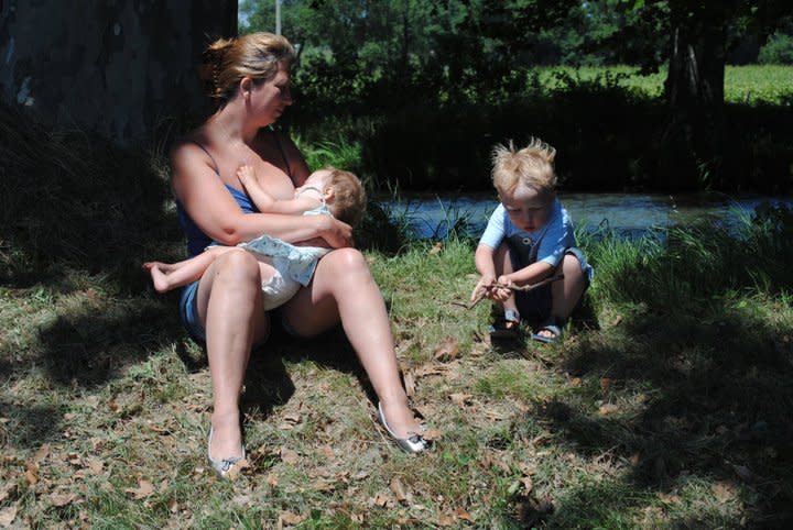 Samantha Gadsden, shown here with her son and daughter in 2011, says she wet-nursed at least eight babies while she was breastfeeding her own children. “I do think a lot more of it goes on than people know,” she tells Yahoo Life. (Photo: Courtesy of Samantha Gadsden)