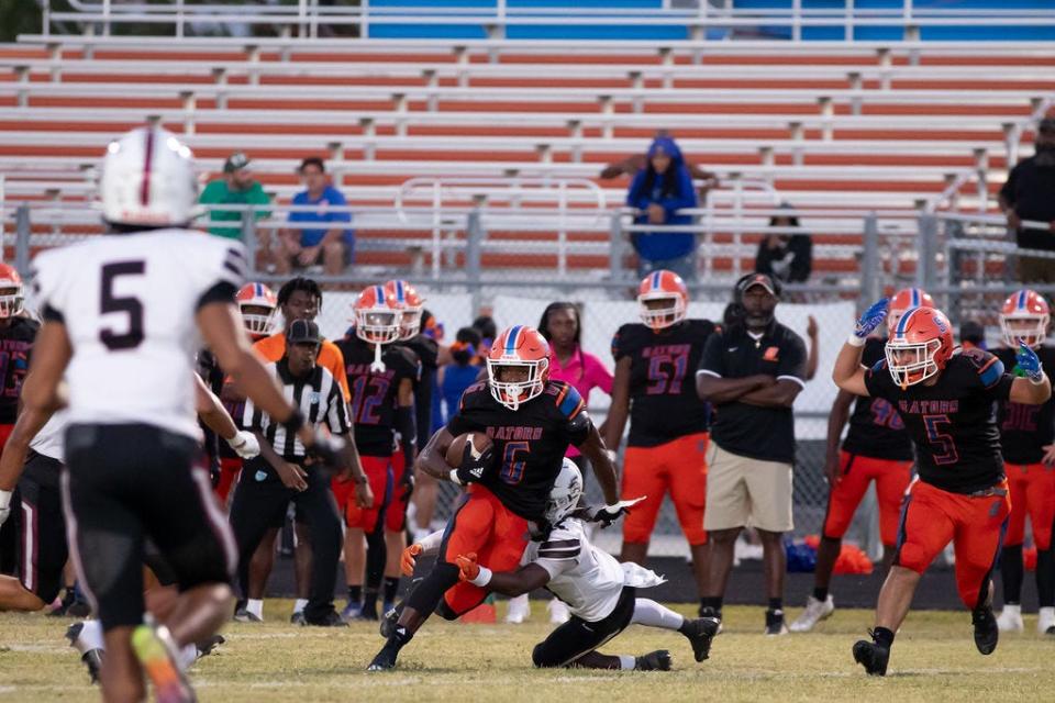 Palm Beach Gardens standout Michael Wright III carries the ball against Palm Beach Central on Friday, Oct. 20, 2023.