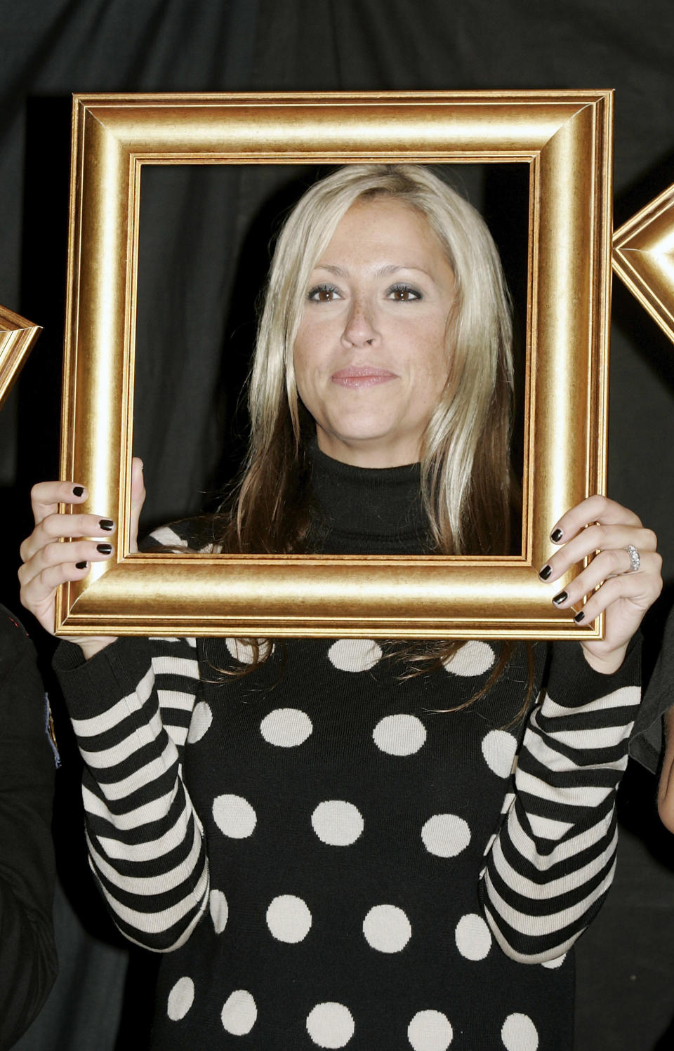 Nicole Appleton of All Saints poses at the Cancer Research UK Sound and Vision photocall at the Proud Galleries in Camden Town, London on February 12, 2007.