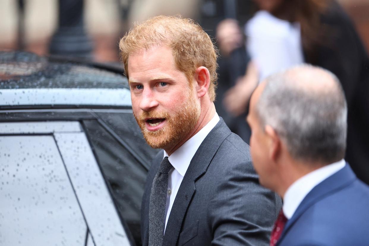 Harry leaving the High Court on Tuesday (REUTERS)