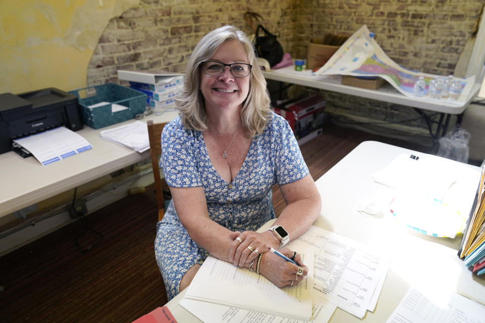 Warren County Auditor candidate Kimberly Sheets works in her campaign office, Tuesday, Aug. 29, 2023, in Indianola, Iowa. (AP Photo/Charlie Neibergall)