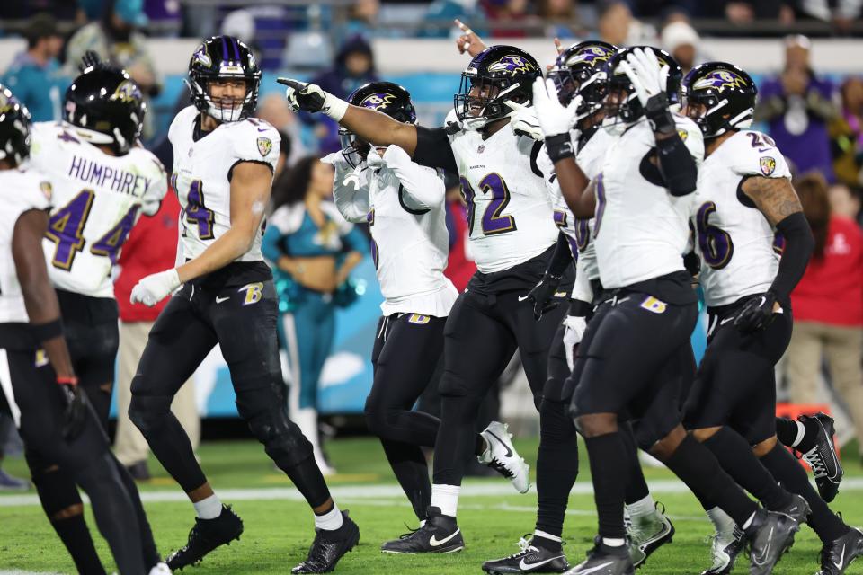 JACKSONVILLE, FLORIDA - DECEMBER 17: Justin Madubuike #92 of the Baltimore Ravens celebrates with teammates after his forced fumble against the Jacksonville Jaguars during the fourth quarter at EverBank Stadium. (Photo by Mike Carlson/Getty Images)