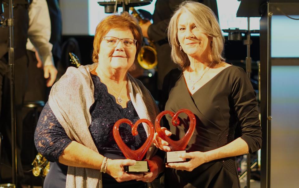 Holy Angels’ leadership presented N.C. Sen. Kathy Harrington, right, and Regina Moody with its Legacy of Love awards – honors that annually recognize persons or groups who have made a last impact on the organization and the differently able that it serves.