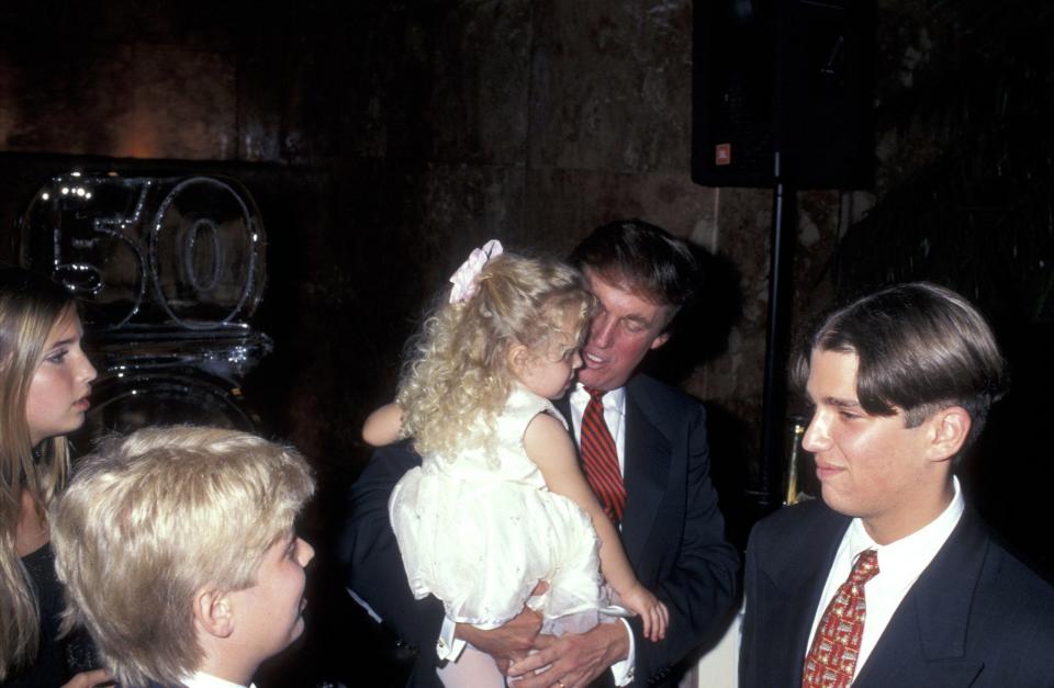 Ivanka Trump, Eric Trump, Tiffany Trump, Donald Trump, and Donald Trump Jr. in 1996.