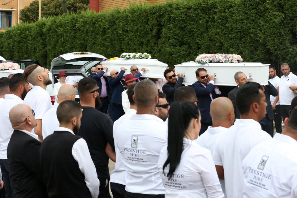 The coffins of Anthony, 13, Angelina, 12 and eight-year-old Sienna Abdallah are seen arriving for their funeral at Our Lady of Lebanon Co-Cathedral on Monday. Source: AAP/Danny Casey