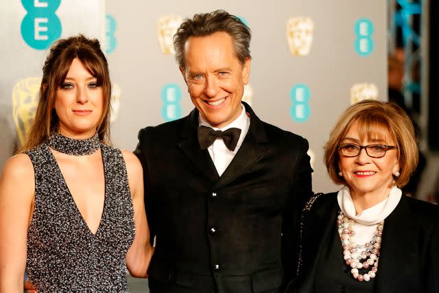 <p>TOLGA AKMEN/AFP via Getty</p> Olivia Grant, Richard E. Grant and Joan Washington