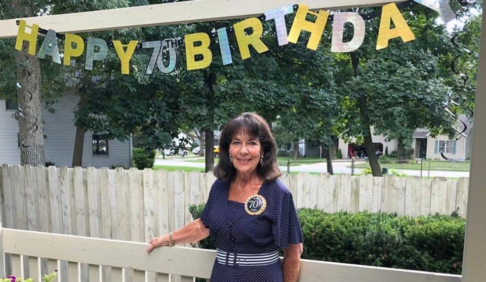 Charlotte Garrison poses in her South Bend backyard. Garrison suffers from a rare immune disorder and got a second chance from doctors at Cleveland Clinic.