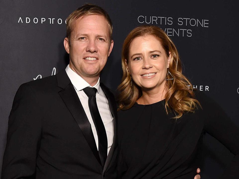 <p>Michael Kovac/Getty</p> Jenna Fischer and her husband Lee Kirk attend the 4th Adopt Together Baby Ball Gala on October 19, 2018 in Los Angeles, California