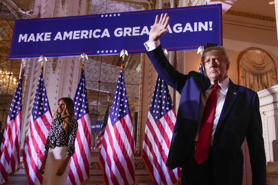 FILE - Former President Donald Trump waves after announcing he is running for president for the third time at Mar-a-Lago in Palm Beach, Fla., Nov. 15, 2022. Trump has returned to Facebook after a more than two-year ban. "I'M BACK!" Trump posted on the site weeks after his personal account was reactivated. (AP Photo/Andrew Harnik)