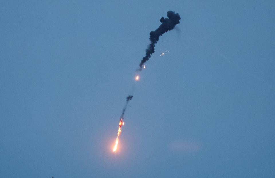 An explosion of a drone is seen in the sky over the city amid Russia's attack on Ukraine, in Kyiv, Ukraine May 4, 2023.