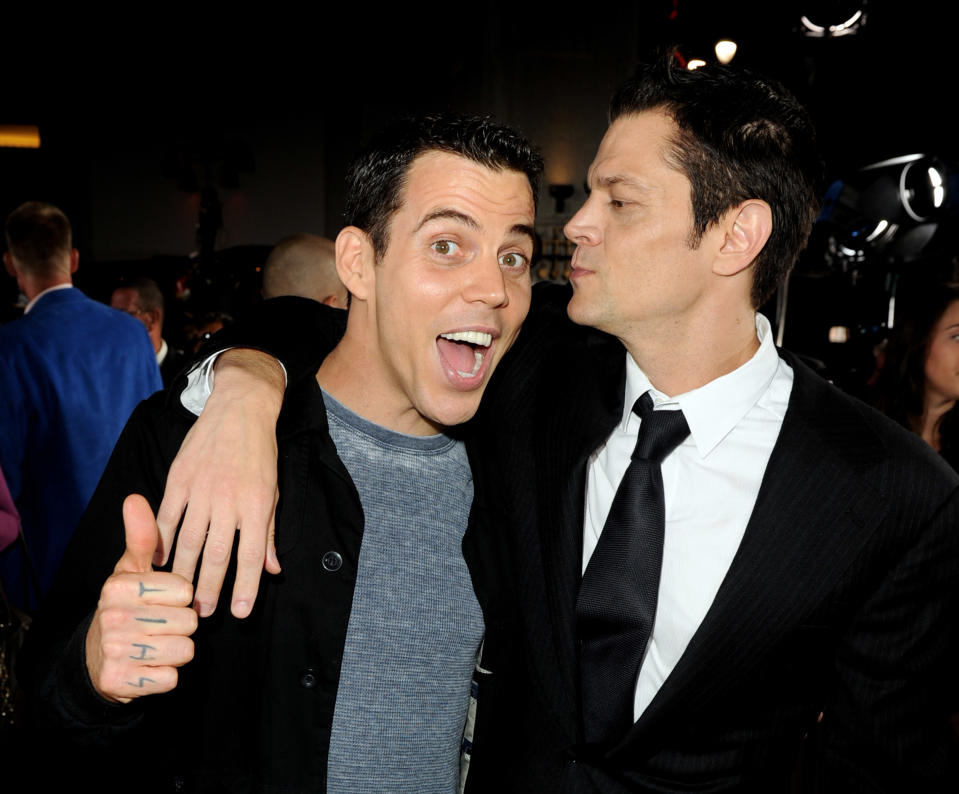 LOS ANGELES, CA - OCTOBER 13:  Actors Steve O (L) and Johnny Knoxville arrive at the premiere of Paramount Pictures and MTV Films' 