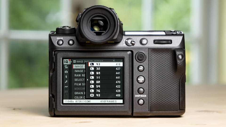 Rear of the Fujifilm GFX100 II on a wooden table