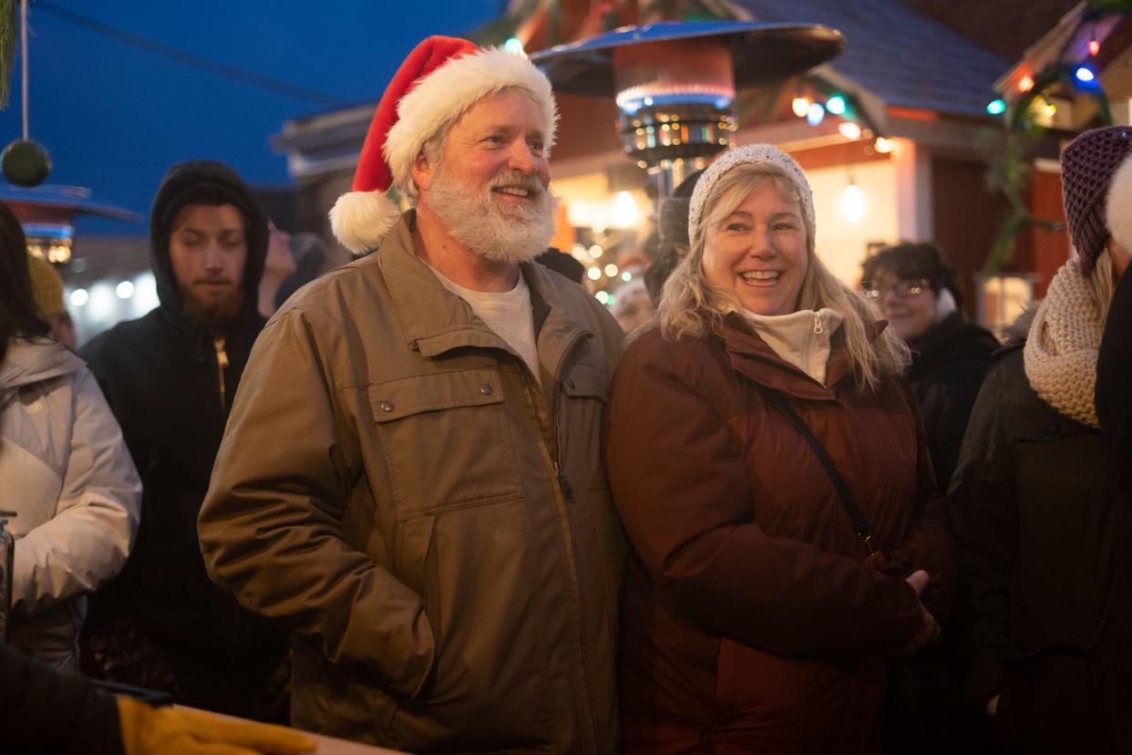 Dave and Tina Stock wait in line at the first SnoMarket on Saturday, Dec. 14, 2019, in the parking lot behind The Norwegian on Main Street in Rockford.