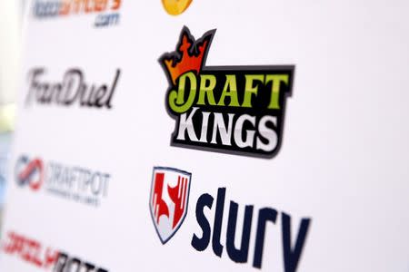 A DraftKings logo is displayed on a board inside of the DFS Players Conference in New York November 13, 2015. REUTERS/Lucas Jackson