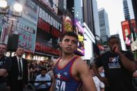 U.S. pro wrestler Tony Ramos prepares to enter the ring at the "Beat The Streets" wrestling event in Times Square, New York City, U.S., May 17, 2017. REUTERS/Joe Penney