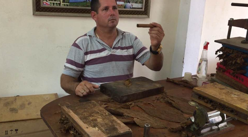 Cuba is the place to smoke a cigar, so let the experts show you how it’s done. Photo: Be