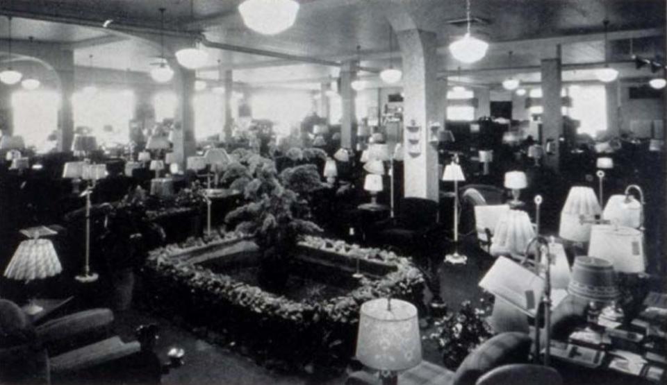 The showroom of the first flagship Floral City Furniture store is pictured circa 1930. In 1927, cousins Edwin Shoemaker and Edward Knabusch established a successful local furniture company, which later became a worldwide leader in the furniture manufacturing and retailing industry – La-Z-Boy.