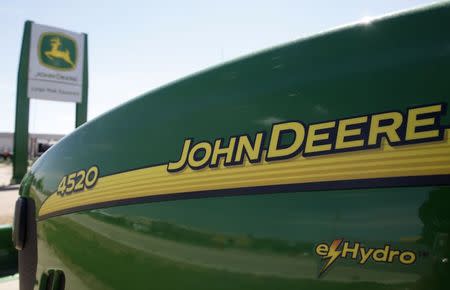 A new John Deere tractor waits for a buyer at a dealer in Longmont, Colorado in this August 18, 2010 file photo. REUTERS/Rick Wilking/Files