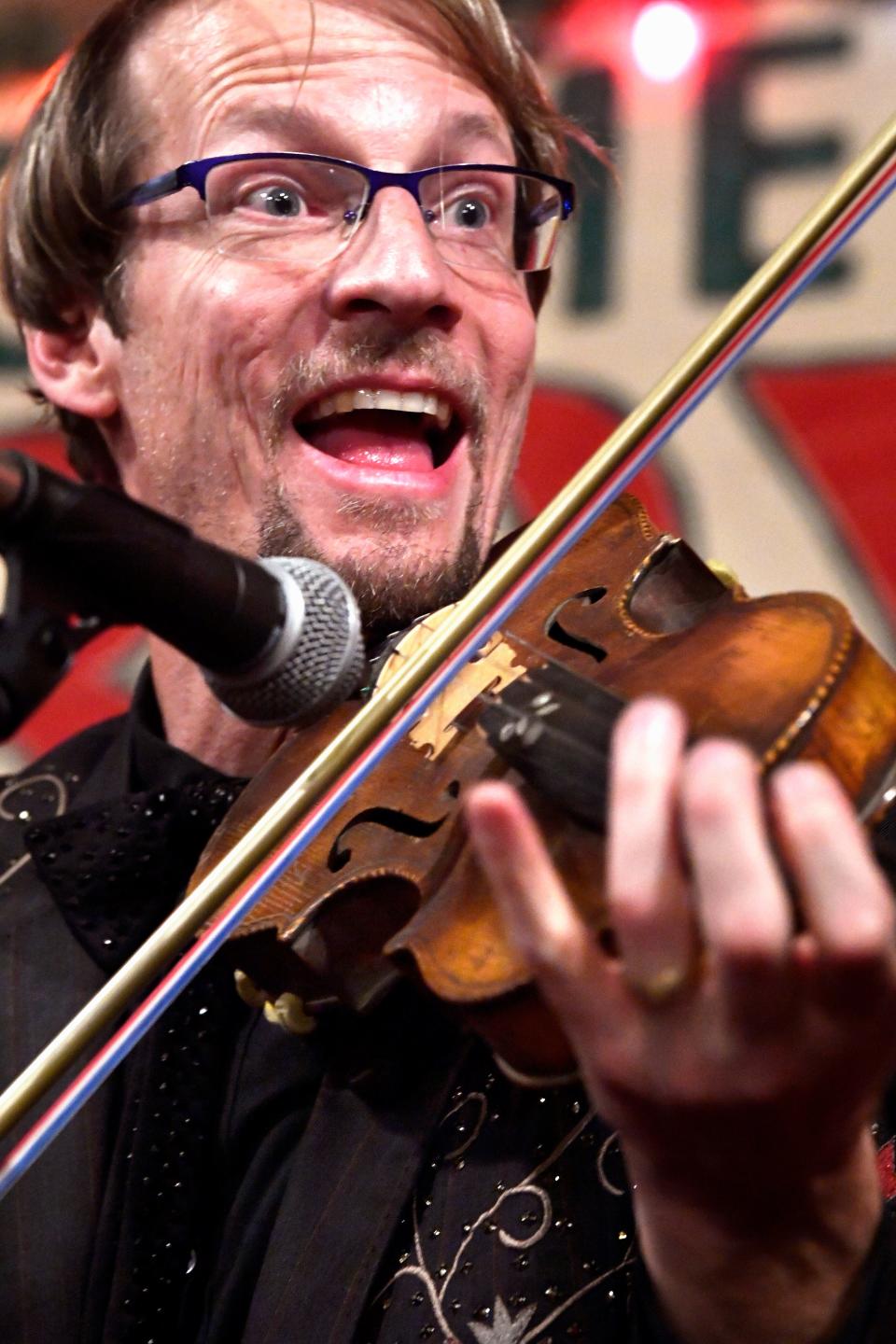 Kyle Dillingham plays the 19th century violin that had performed in the 1885 Texas Cowboys’ Christmas Ball.