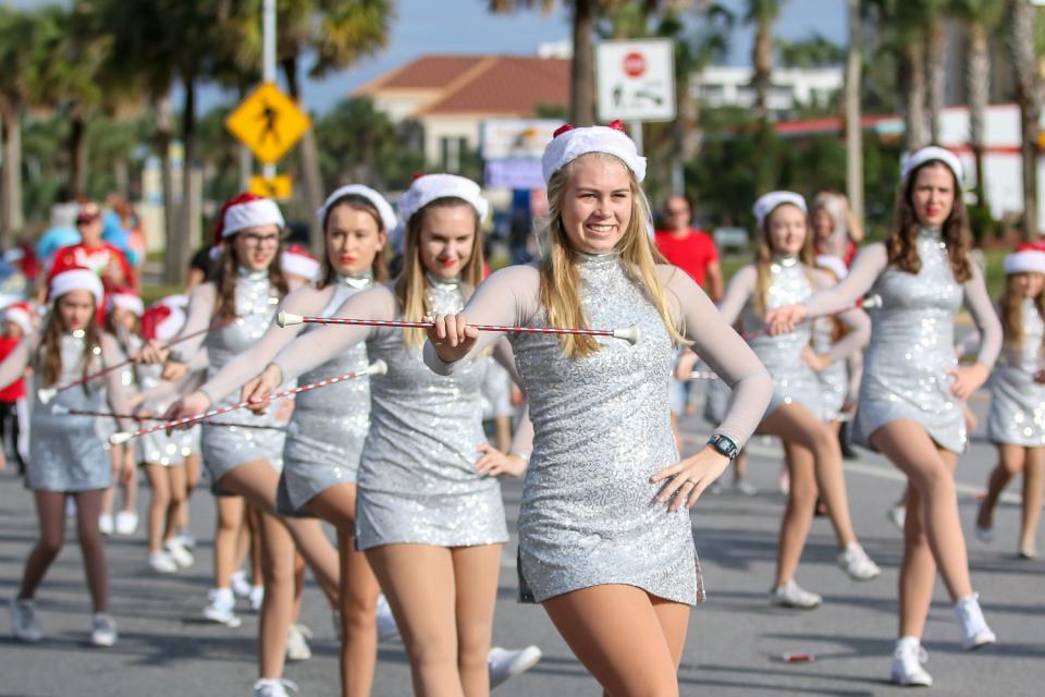 The Pensacola Beach Chamber of Commerce's annual Surfing Santa Beach Parade delights people on Sunday, December 2, 2018.