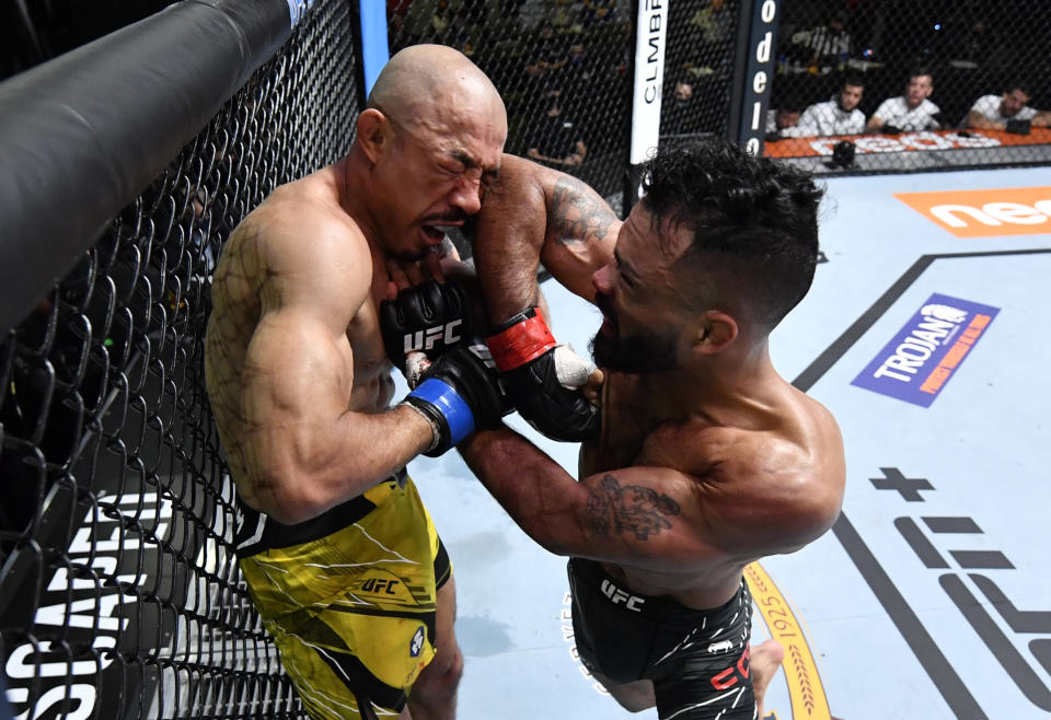 LAS VEGAS, NEVADA - DECEMBER 04: (R-L) Rob Font elbows Jose Aldo of Brazil in their bantamweight fight during the UFC Fight Night event at UFC APEX on December 04, 2021 in Las Vegas, Nevada. (Photo by Jeff Bottari/Zuffa LLC)