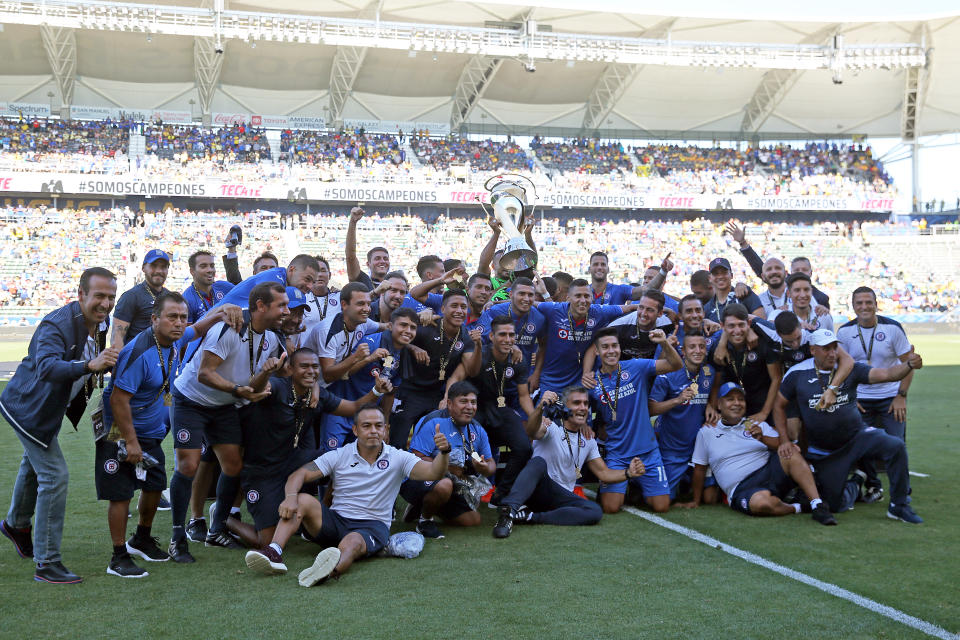 CARSON, CA - JULY 14: Players of Club Necaxa pose with the trophy to celebrate after winning the match between Cruz Azul and Necaxa as part of the SuperCopa MX at Dignity Health Sports Park on July 14, 2019 in Carson, California. (Photo by Omar Vega/Getty Images)