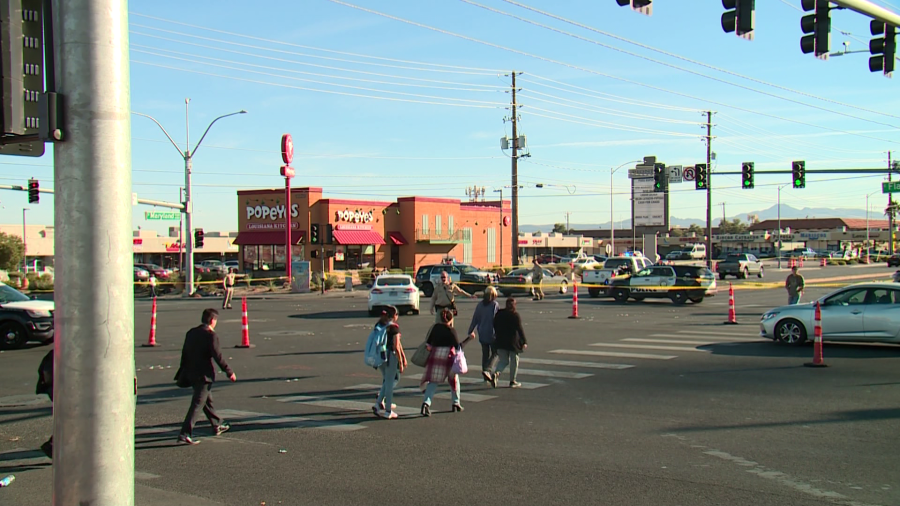 <em>Loved ones reunite near Maryland Parkway and Flamingo Road on Dec. 6, 2023 (KLAS)</em>