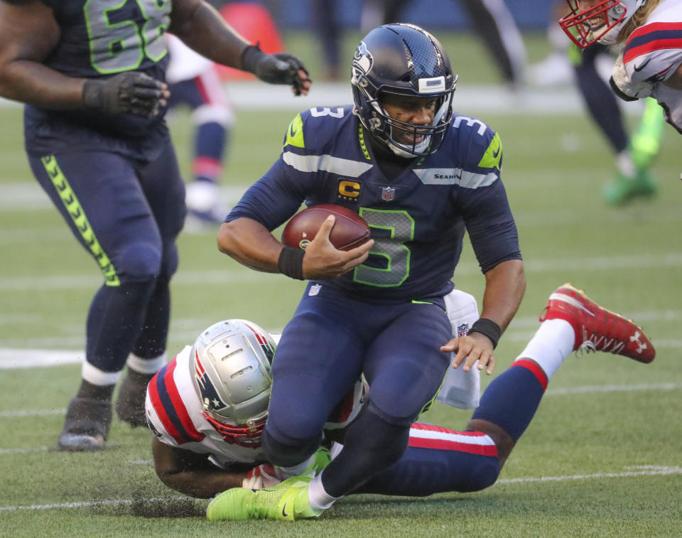 The initial audience for Russell Wilson and the Seattle Seahawks' win over the New England Patriots on Sunday night was down from Week 1's matchup. (Photo by Matthew J. Lee/The Boston Globe via Getty Images)