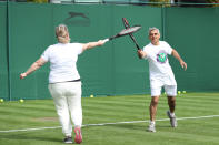 Mayor of London Sadiq Khan plays tennis with a key worker at the All England Lawn Tennis Club in Wimbledon, south west London, during an event to thank members of the NHS, TfL and care workers for their service during the coronavirus pandemic.