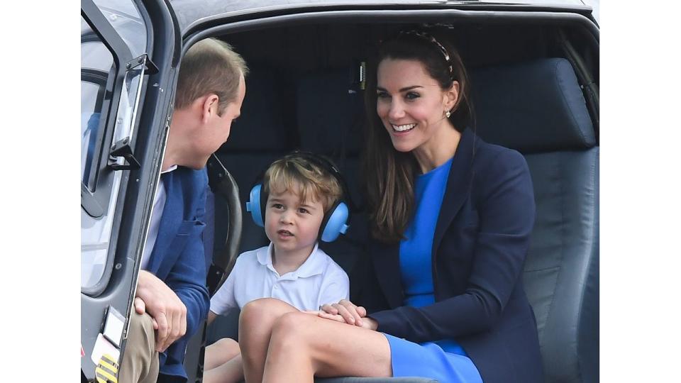 Catherine, Duchess of Cambridge, Prince George of Cambridge and Prince William, Duke of Cambridge sit in a helicopter as they attend the The Royal International Air Tattoo at RAF Fairford on July 8, 2016