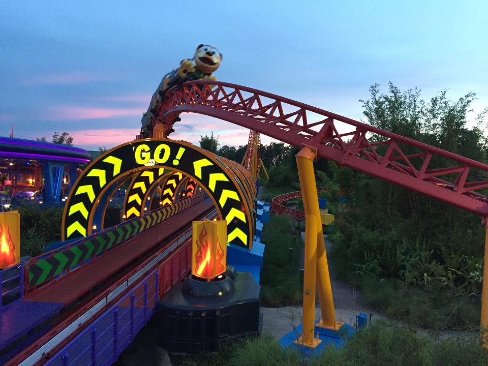 Slinky Dog Dash lights up at night.