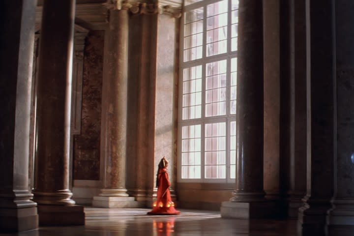 Padme stands in front of a window in Star Wars: Episode I - The Phantom Menace.