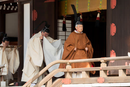 Japan's Emperor Akihito walks for a ritual at the Imperial Palace in Tokyo in this handout picture taken March 12, 2019 and provided by the Imperial Household Agency of Japan. Imperial Household Agency of Japan/Handout via Reuters