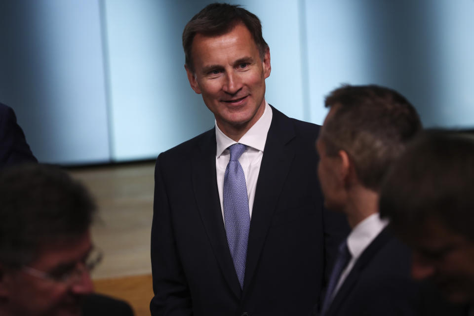 British Foreign Secretary Jeremy Hunt, center, arrives for a group photo of EU foreign ministers and their Eastern partner countries at the Europa building in Brussels, Monday, May 13, 2019. (AP Photo/Francisco Seco)