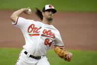 Baltimore Orioles starting pitcher Dean Kremer throws a pitch to the Tampa Bay Rays during the second inning of a baseball game, Thursday, Sept. 17, 2020, in Baltimore. (AP Photo/Julio Cortez)
