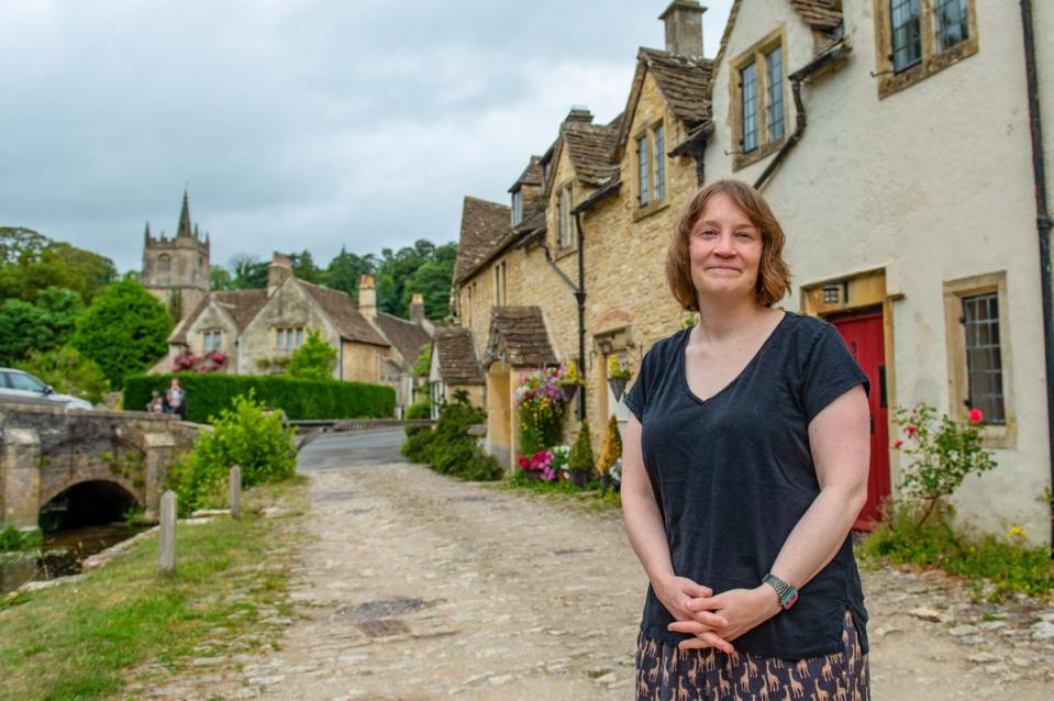 Georgina Kingshot outside her home in Castle Combe (SWNS)