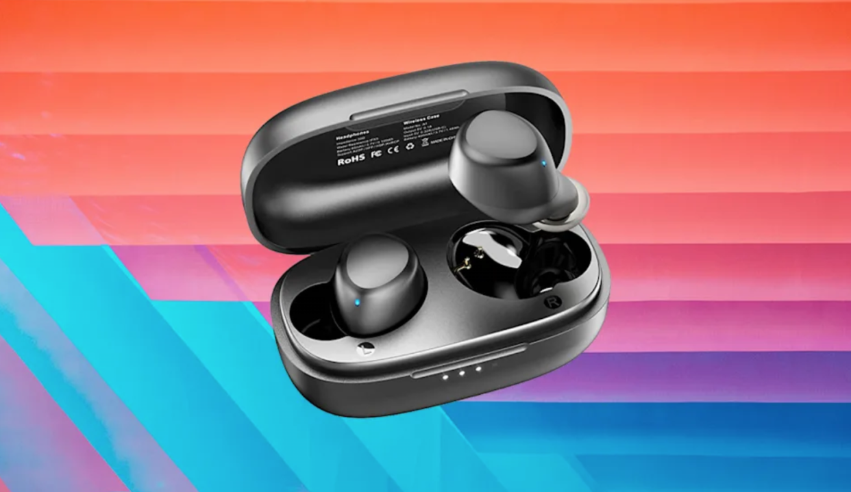 Black wireless earbuds in a black charging case