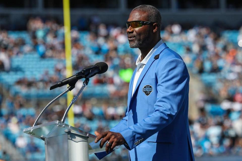 Panthers legend Muhsin Muhammad delivers remarks at the Hall of Honor induction ceremony during halftime of Texans at Panthers at Bank of America Stadium on Sunday, October 29, 2023.