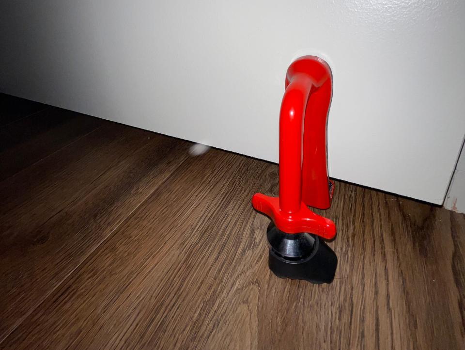 red hotel safety door stopper