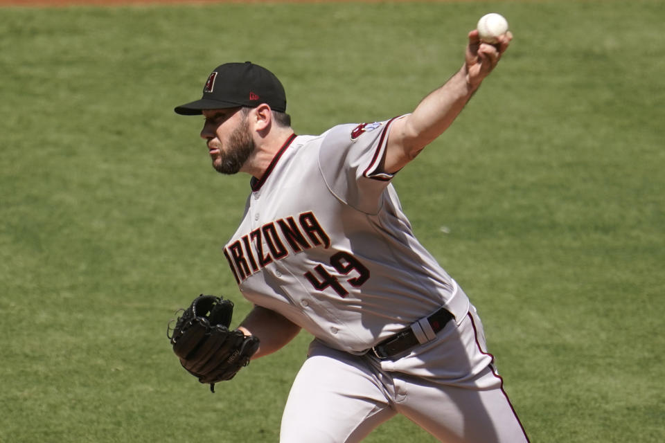 Arizona Diamondbacks starting pitcher Alex Young throws to the Los Angeles Angels during the first inning of a baseball game Thursday, Sept. 17, 2020, in Anaheim, Calif. (AP Photo/Marcio Jose Sanchez)