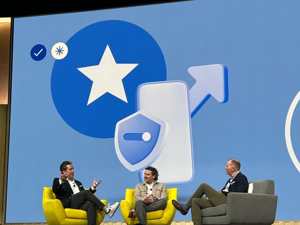 Ethan Braden (left) Jon Gieselman of Expedia (center) and Mike Henry of Google speaking at 2022's Google Marketing Live conference.