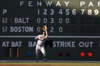 Baltimore Orioles' Trey Mancini makes the catch on the fly out by Boston Red Sox's Rafael Devers during the fifth inning of a baseball game in Boston, Sunday, Sept. 29, 2019. (AP Photo/Michael Dwyer)